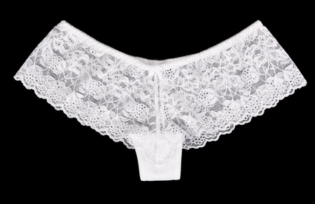 white women's underwear isolated on black backgroundの写真素材