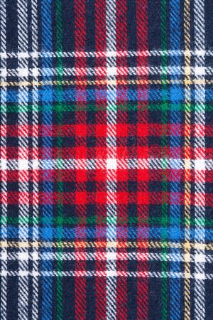 The checkered background from the warm clothの写真素材