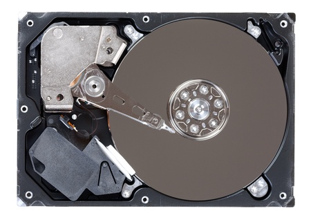 Close-up inside view of hard disk isolated on white background