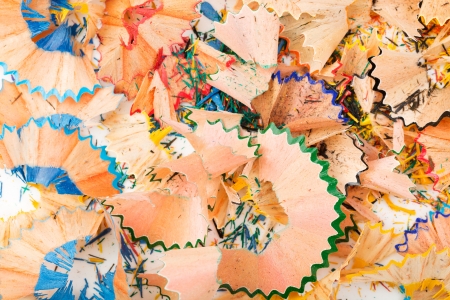 Background of wood shavings from grinding crayonsの写真素材