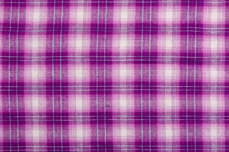 Purple cloth, checkered background.の写真素材