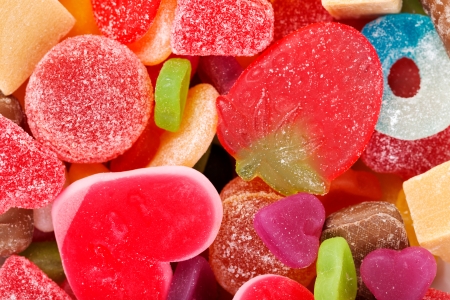 chewy colored candies in the shape of the backgroundの写真素材