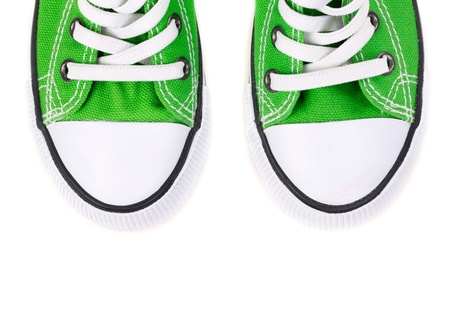 green sneakers  isolated on white backgroundの写真素材