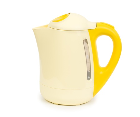 electric yellow tea kettle isolated on white background with clipping pathの写真素材