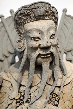 antique statue of a Thai soldier close upの写真素材