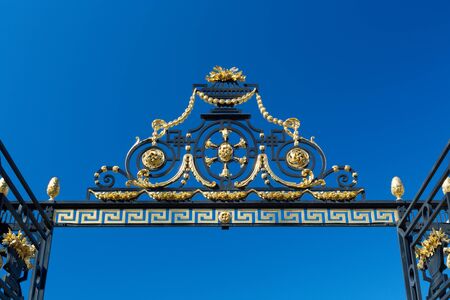 Detail of the gate against the blue sky. Summer Garden, St. Petersburg, Russiaの写真素材