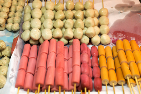 Semi-finished skewers with sausage asia kitchenの写真素材