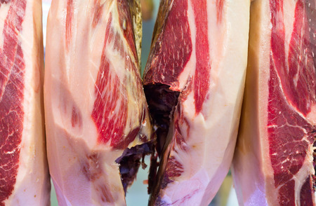 Jerk ham hanging in a store, Barcelona, â€‹â€‹Spain. Submitted to National dish.