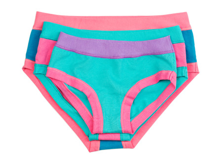 Three female colored Cotton panties. Isolate on white.の写真素材