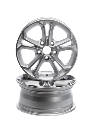 Two steel alloy car rims on a white background.の写真素材
