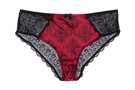 Red lace panties with black lace, isolate on a white backgroundの写真素材