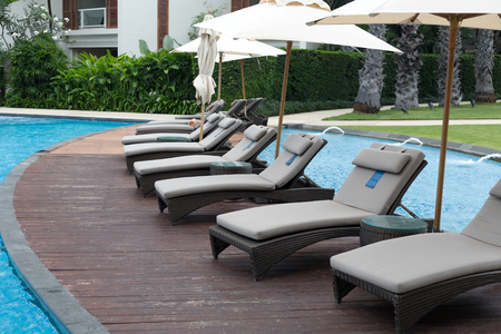 Sun beds by the pool with a roof in the cottageのeditorial素材