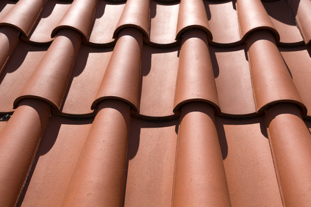 Roof tiles background texture in regular rows