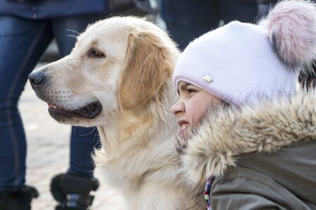 look girls and dogs, animals and people friends