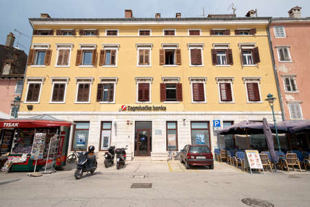 ROVINJ, CROATIA - AUG 30, 2007 : View of an old house with a Bank of Zagreb branch office in the center of Rovinj old town which is a Croatian fishing port on the west coast of the Istrian peninsulaのeditorial素材