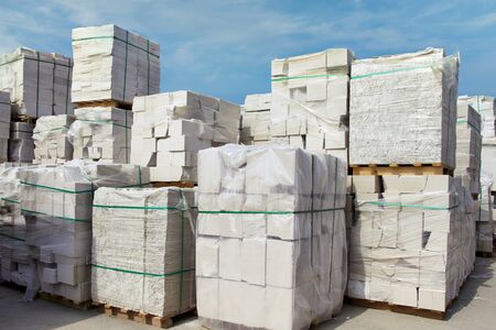 Autoclaved aerated concrete blocks on pallets stored at warehouseの写真素材