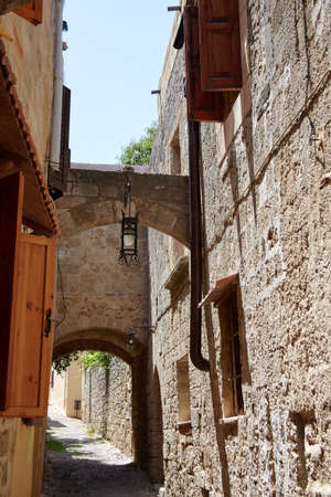 Street in ancient greek town, Rhodes Island, Greeceの写真素材