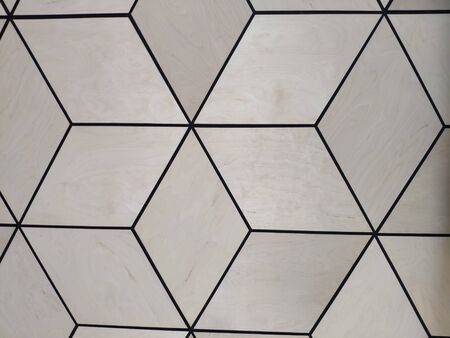 spotlight on a tripod, old vintage lamp on a background of decorative plaster