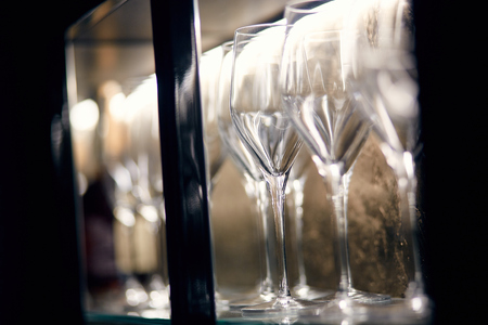 glasses on a table in a restaurantの写真素材