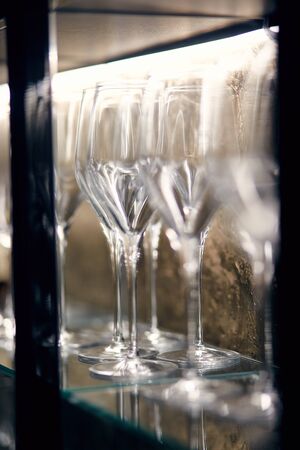 glasses on a table in a restaurantの写真素材