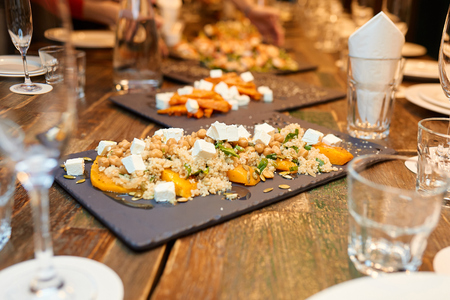 tartlets on a tray in a restaurantの写真素材