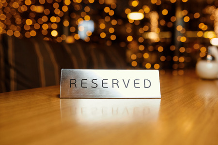 Reserved plate on a table in a restaurant