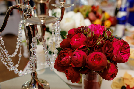 Beautiful decor of flowers on the wedding table of the newlywedsの写真素材