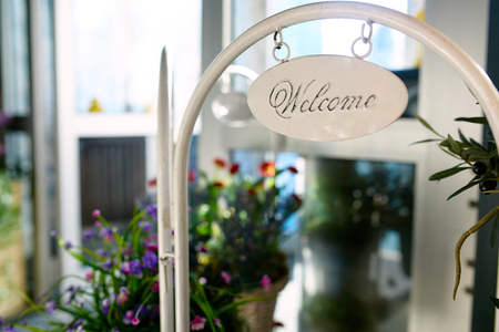 Decorative signboard welcome to the restaurantの写真素材