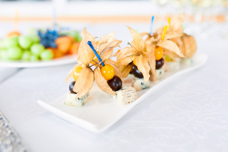 wedding dish on a white plate on a white tableの写真素材
