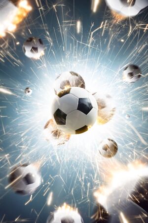 Soccer balls with fire sparks in actionの写真素材