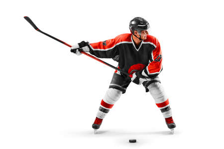 Hockey. sports emotions. Professional hockey athlete swinging his stick before a decisive blow. tension and rage. Athlete in action. Sportの写真素材