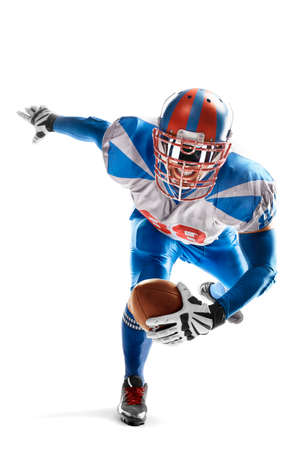 american football. Young agile american football player running fast towards the goal line. sports emotions. Sportsman in action. Strongの写真素材