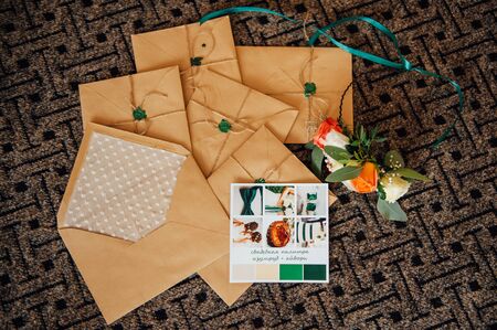 Handmade wedding invitations made of paper color emeraldの写真素材