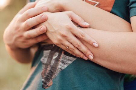 Happy love  couple holding hands in the morning at outdoorの写真素材