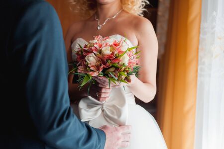 Bride and groom have fun during the wedding dayの写真素材