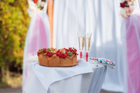 Delicious wedding loaf and salt are ready for guests.の写真素材