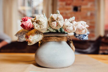 Colorful artificial flowers made from cloth. like tulips. handmadeの写真素材