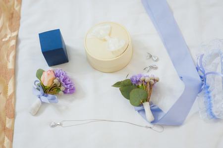 close up by bridal wedding accessories on dressing table.の写真素材