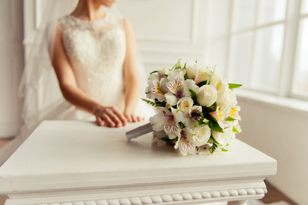beautiful modern wedding bouquet on white tableの写真素材
