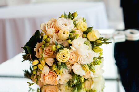 premium Wedding bouquet of roses on the luxury mirror tableの写真素材
