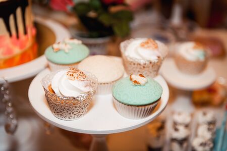 Beautiful delicious white wedding cake ceremony at the tableの写真素材