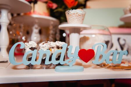 Beautiful delicious white wedding cake ceremony at the tableの写真素材