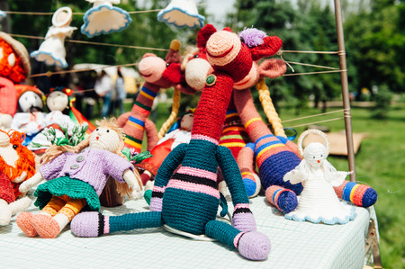 Ukrainian souvenirs - Knitted toys. on a tableの写真素材