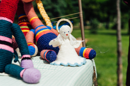 Ukrainian souvenirs - Knitted toys. on a table