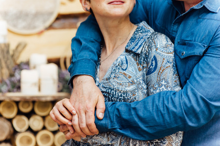Happy love adult couple holding hands in the morning at outdoorの写真素材