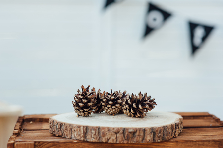 Pine cones on wooden background. Selective focusの写真素材