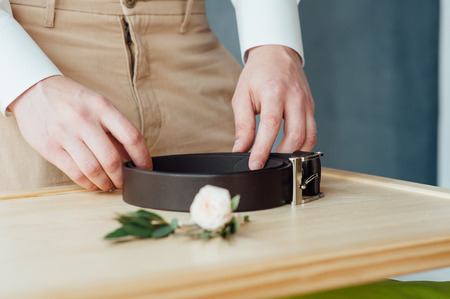 Set of groom clothes. Wedding rings, shoes, cufflinks and bow tie detalis fashionの写真素材