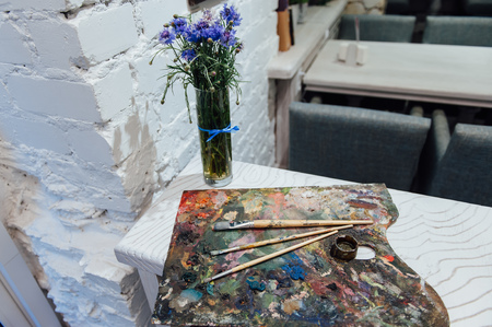 Spring flowers set. on a white brick backgroundの写真素材