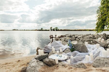 Wedding photo zone. Wedding decoration in Provence style on the river bankの写真素材