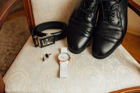 Set of groom clothes. Wedding rings, shoes, cufflinks and bow tie detalis fashionの写真素材